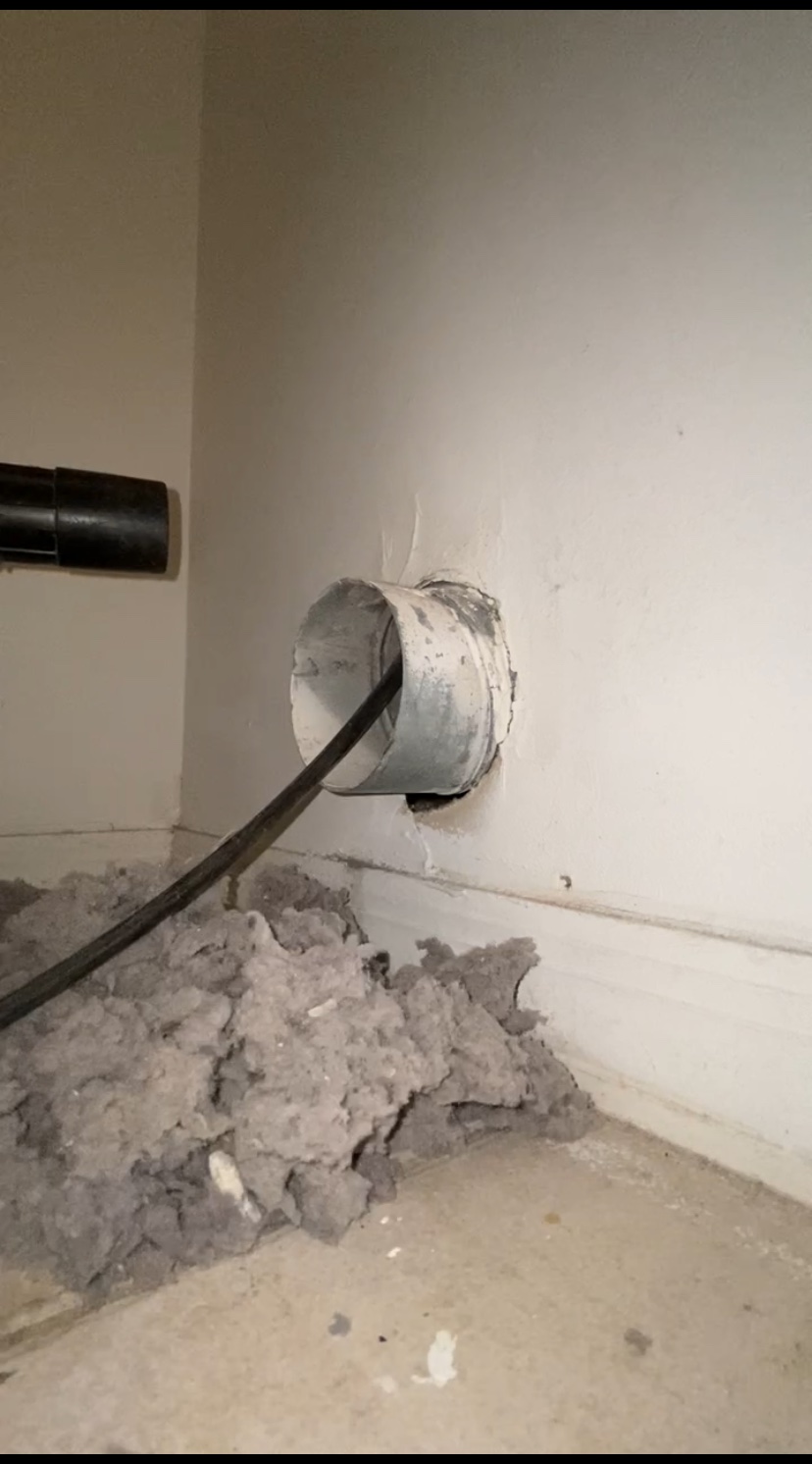 Dryer vent clogged with lint during cleaning in Naples, FL