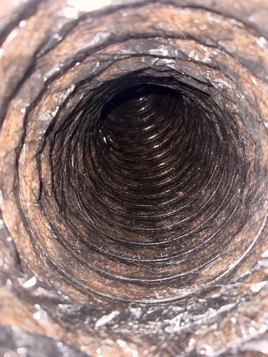 Post-service view inside a flexible HVAC duct